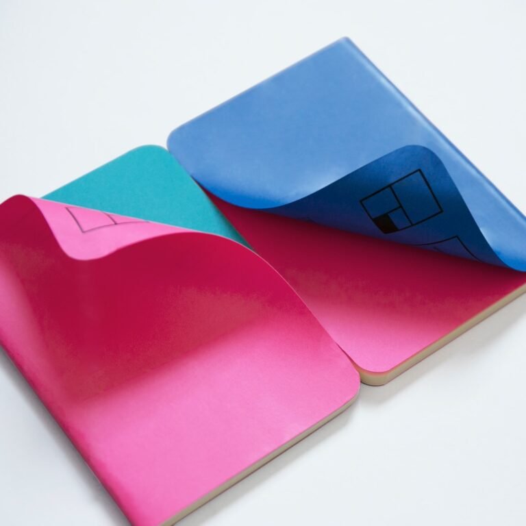 two pink and blue books